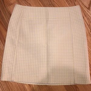 Small yellow polka dotted skirt